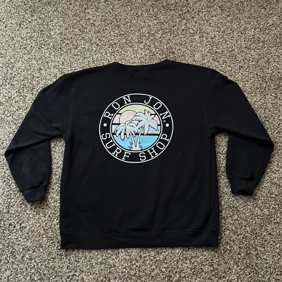 This Ron Jon crewneck is a women’s large and dark grey color - Picture 2 of 2